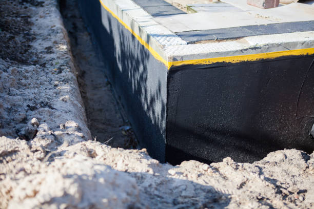 Professional Waterproofing technician working in Martin, TN